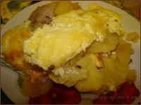 Курочка, запеченная с ананасами, картофелем и сыром